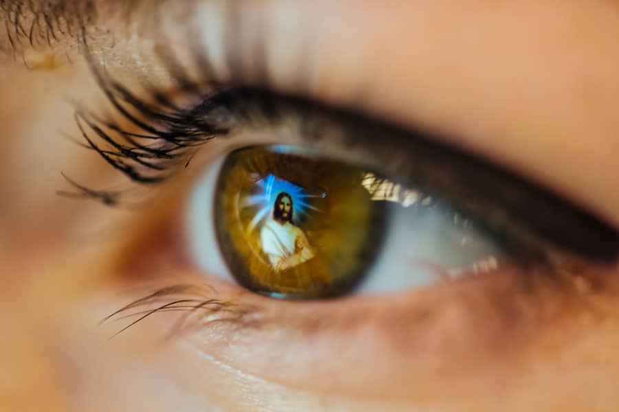 Jesus Christ Icon Reflected On Eye